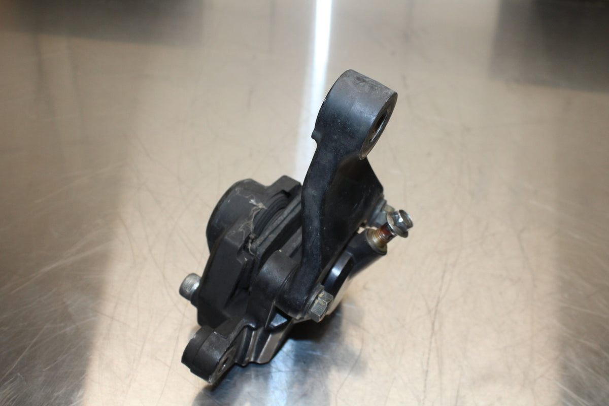 86 SUZUKI GS750ES REAR BACK BRAKE CALIPER W MOUNT BRACKET BB140