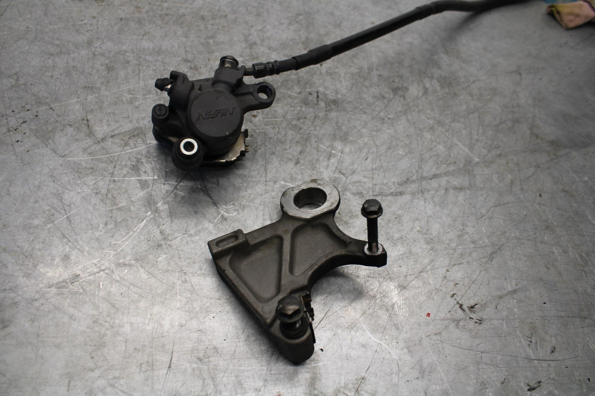 08-16 YAMAHA YZF R6 REAR BACK BRAKE CALIPER W MOUNT BRACKET BB431