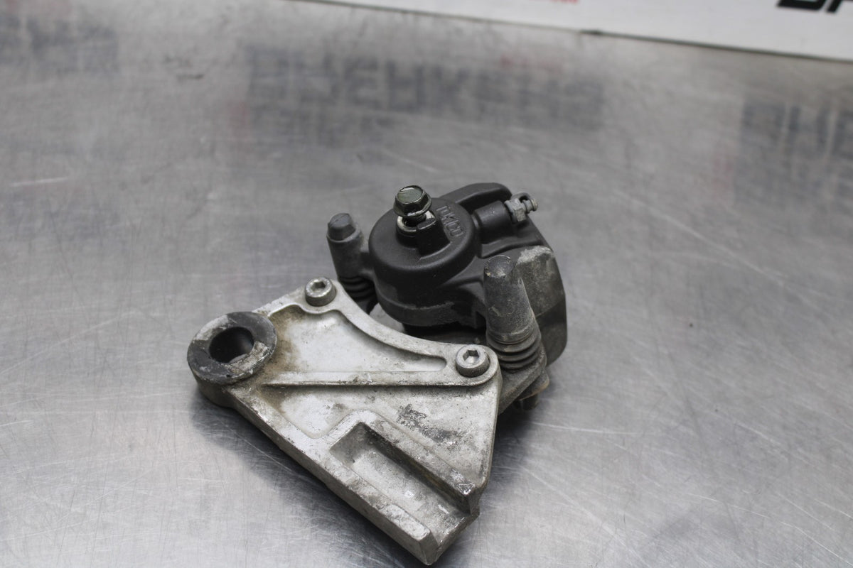 06 KAWASAKI Z750 REAR BACK BRAKE CALIPER W MOUNT BRACKET BB837