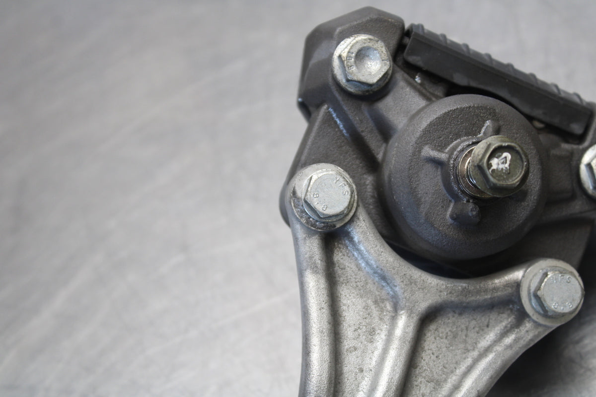 04-09 SUZUKI GS500F REAR BACK BRAKE CALIPER W MOUNT BRACKET BB165