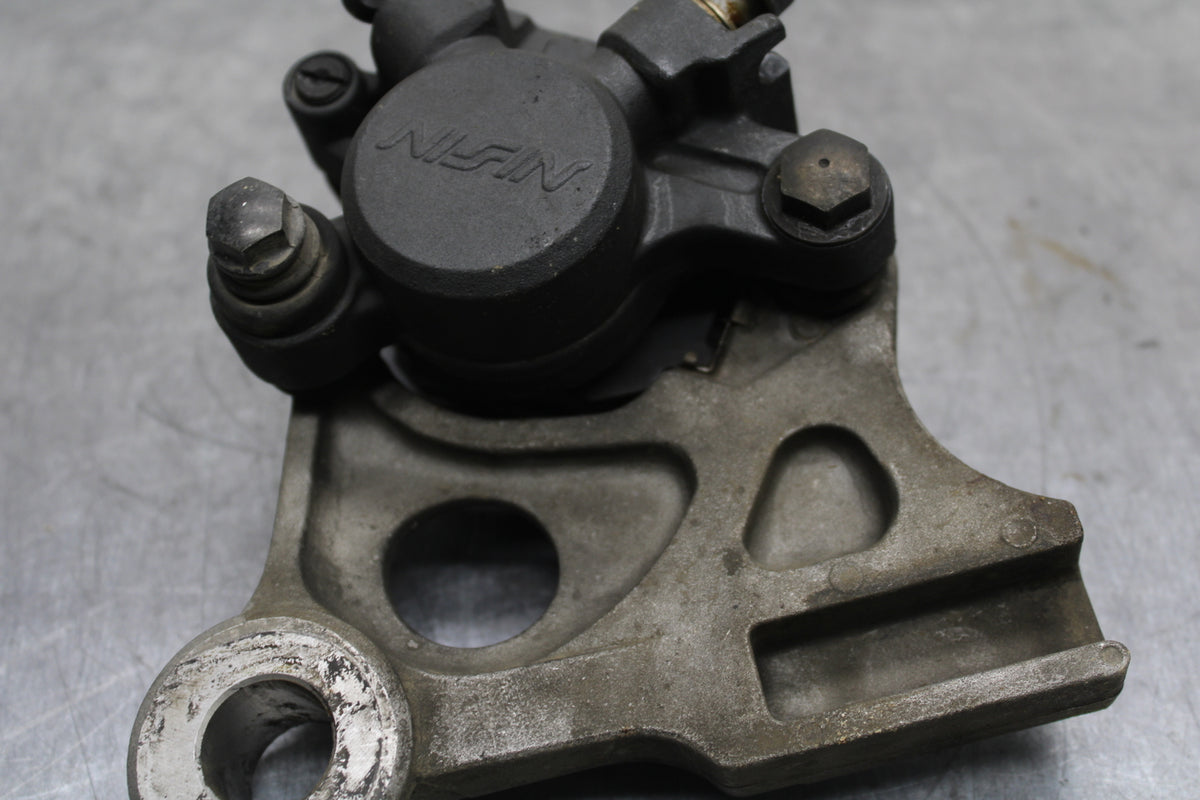 01-06 HONDA CBR600F4I REAR BACK BRAKE CALIPER W MOUNT BRACKET BB115