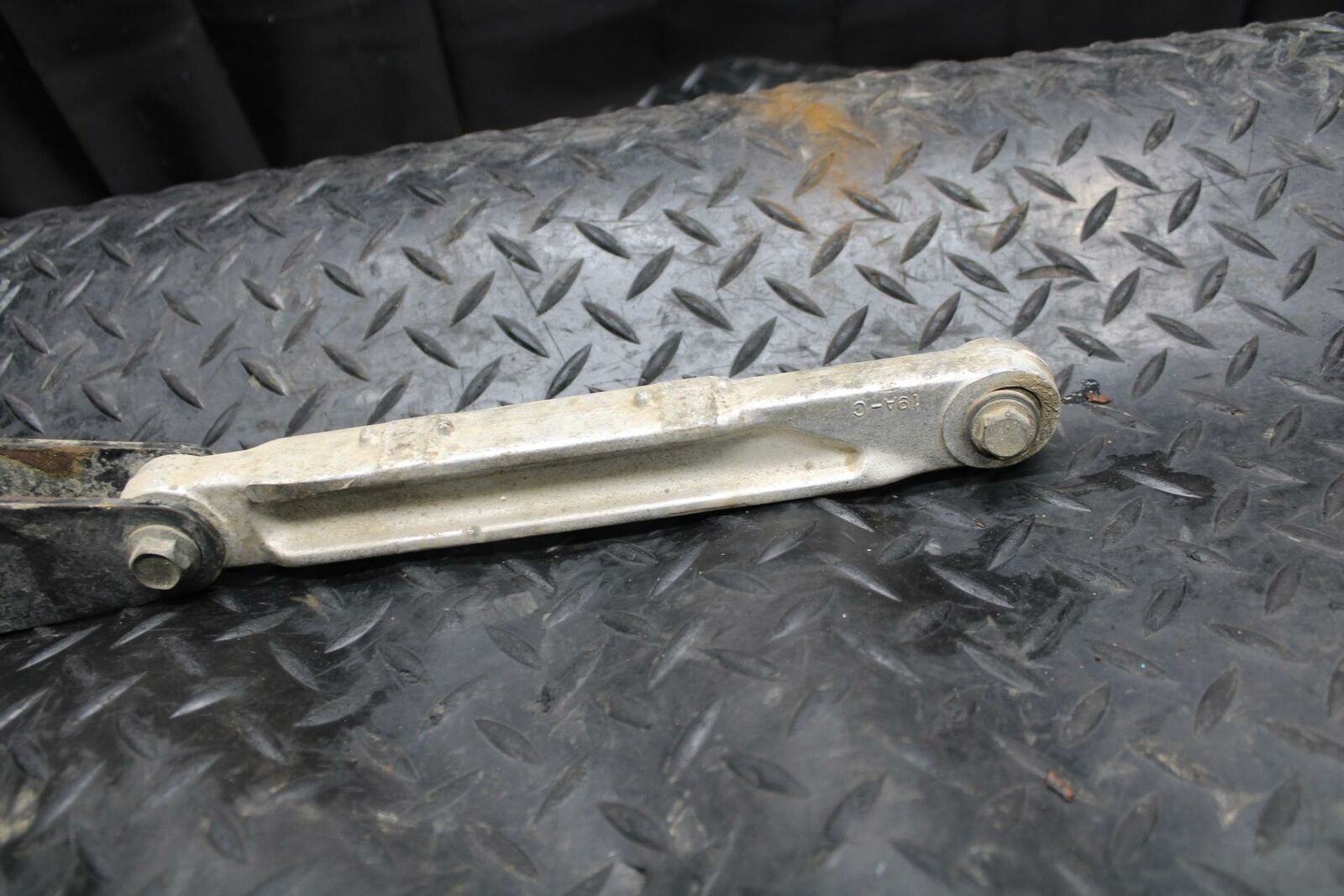 85-86 SUZUKI QUADRACER 250 REAR DOGBONE SHOCK LINKAGE LINK BB210