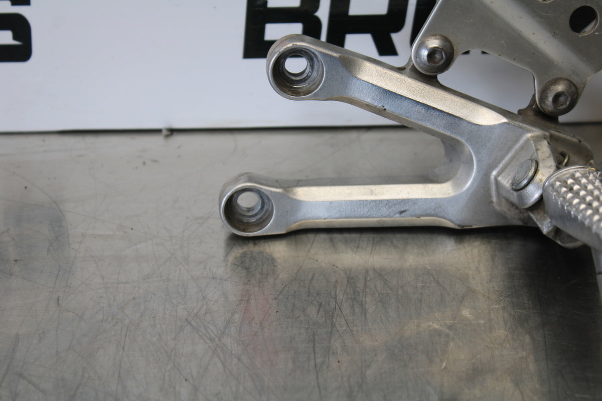 06-07 HONDA CBR1000RR LEFT REARSET REAR SET DRIVER FOOT PEG REST STOP BB166