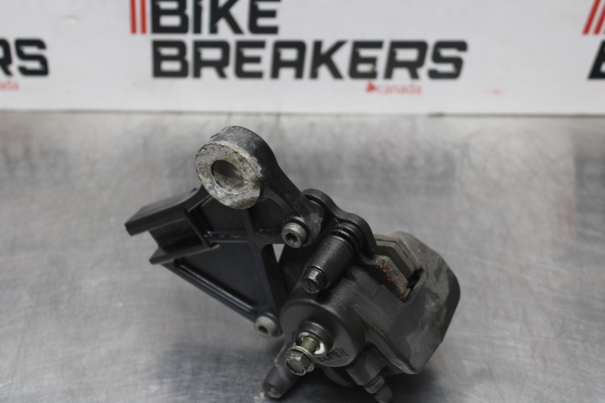 06-07 KAWASAKI NINJA 650R EX650A REAR BACK BRAKE CALIPER W MOUNT BRACKET BB774