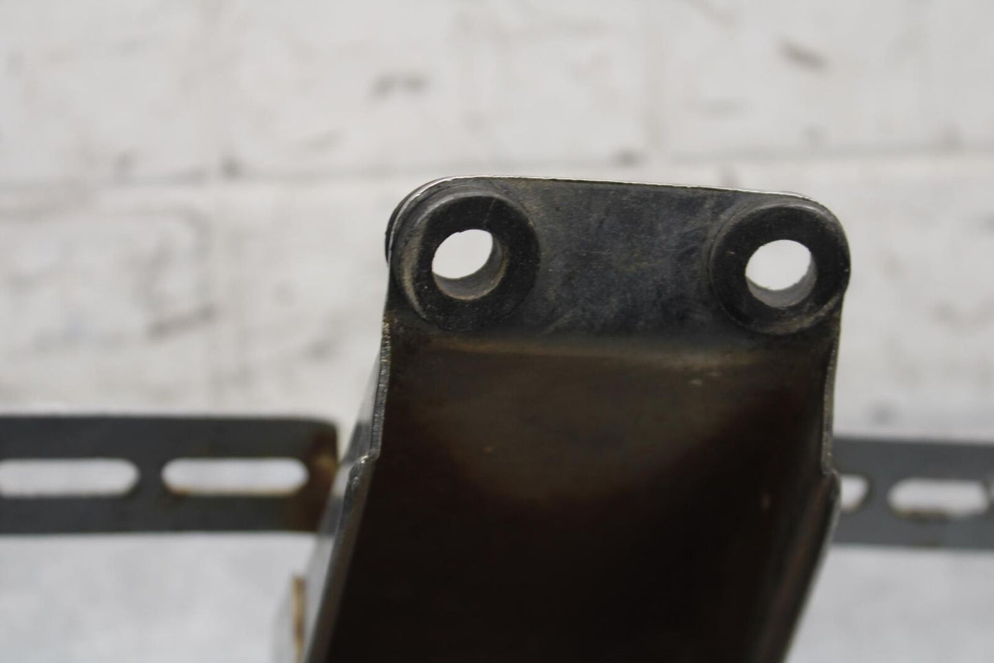 75 SUZUKI GT 550 REAR BACK TAIL LIGHT MOUNT BRACKET BB67