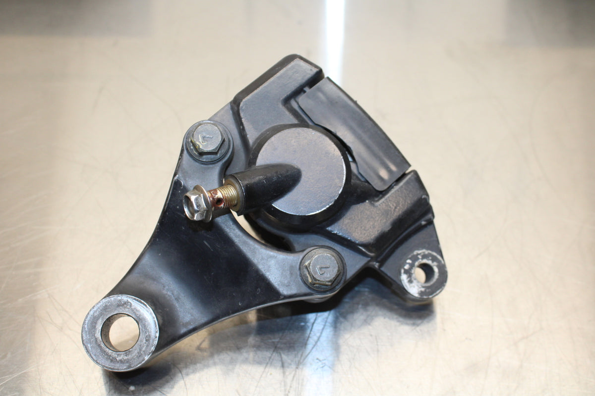 86 SUZUKI GS750ES REAR BACK BRAKE CALIPER W MOUNT BRACKET BB140