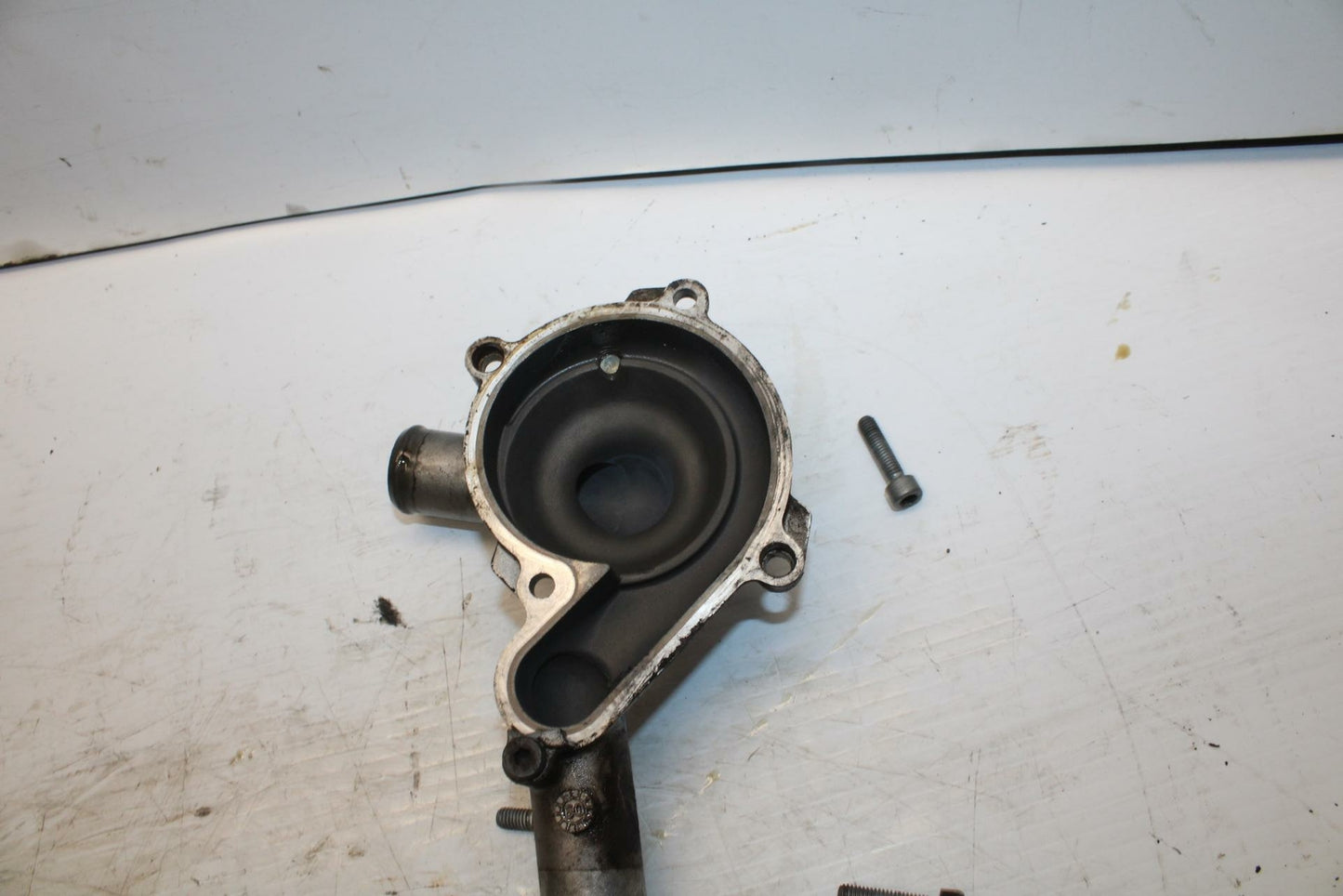 10-11 APRILIA RSV4 ENGINE WATER COOLANT PUMP COVER   BB268