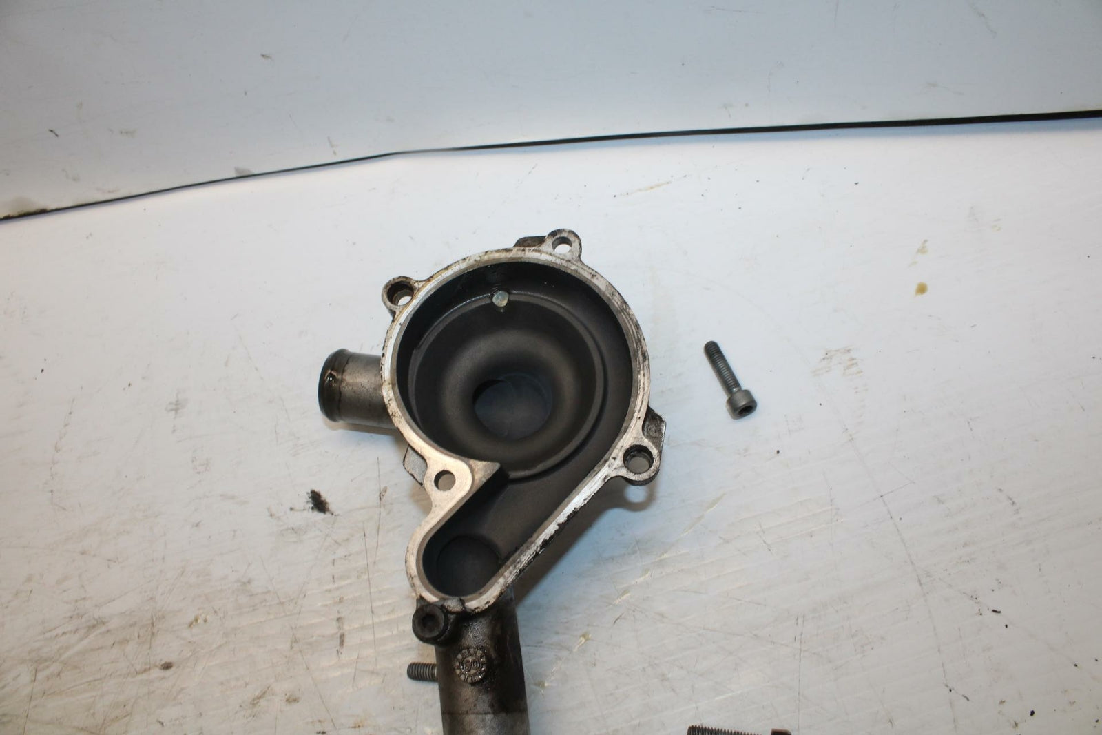 10-11 APRILIA RSV4 ENGINE WATER COOLANT PUMP COVER   BB268