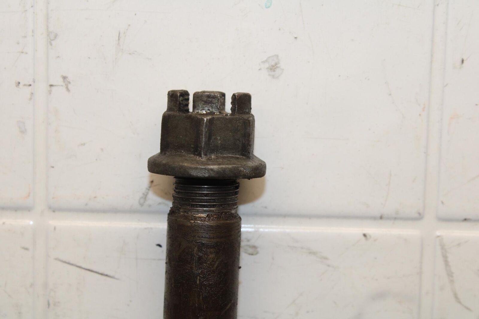 1977 Honda CB550K --- REAR AXLE BACK WHEEL PIVOT BOLT AXEL 42301-300-020 BB592