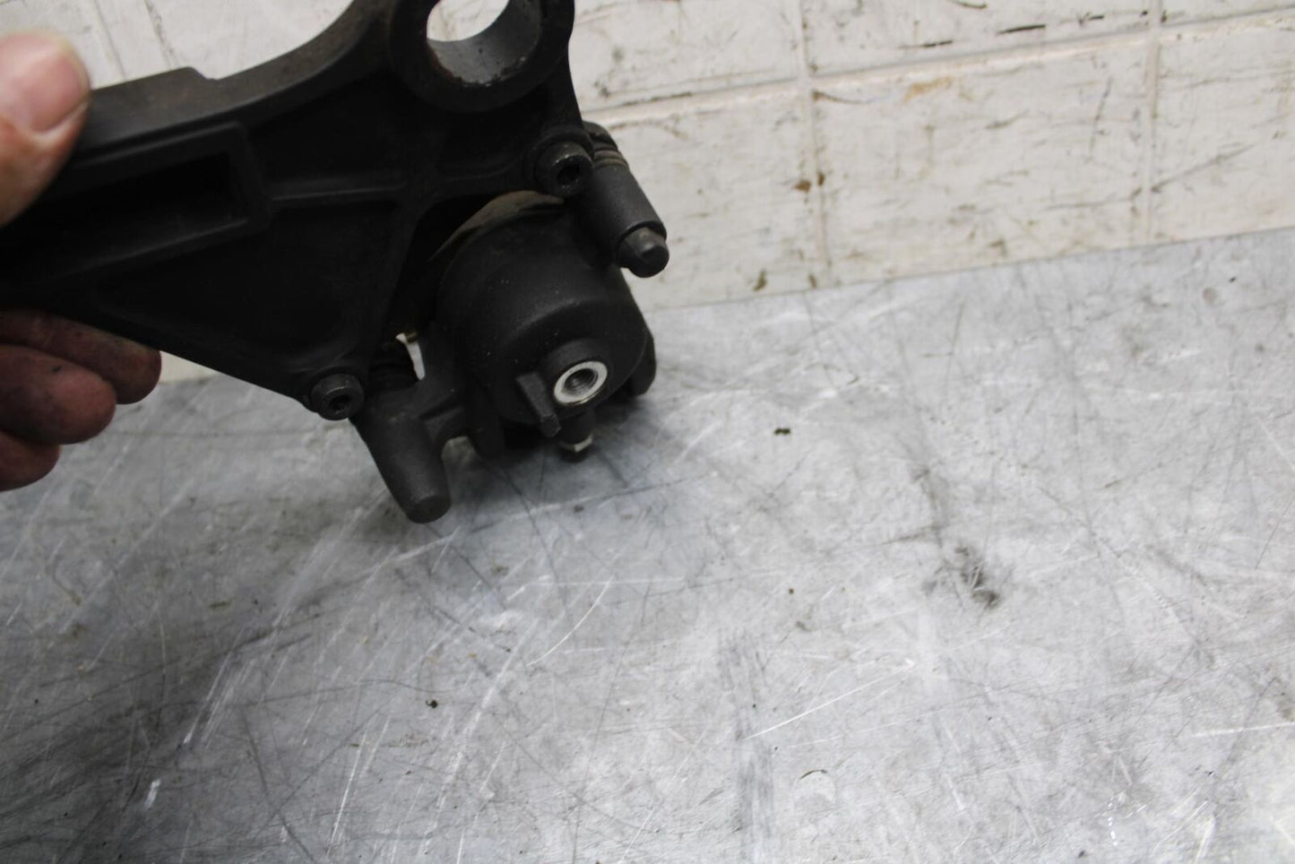 2009 Kawasaki Ninja ZX6R  REAR BACK BRAKE CALIPER W MOUNT BRACKET BB44