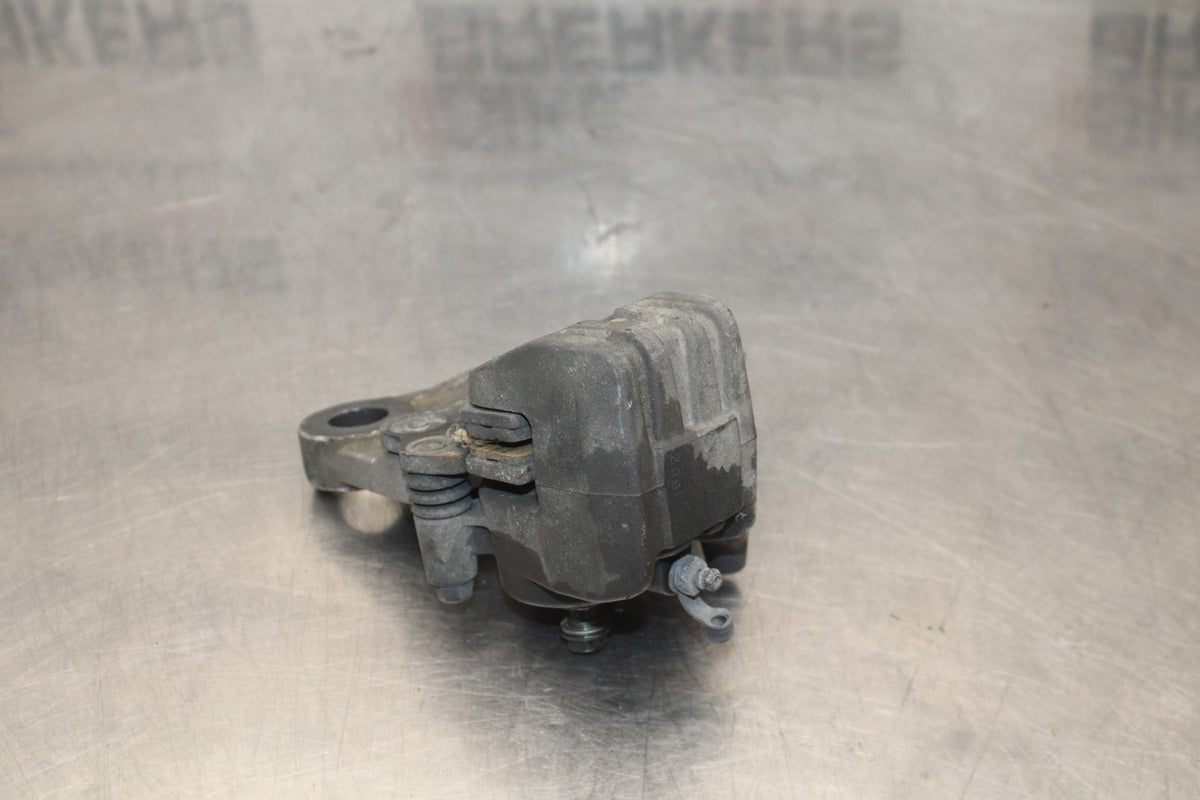 06 KAWASAKI Z750 REAR BACK BRAKE CALIPER W MOUNT BRACKET BB837
