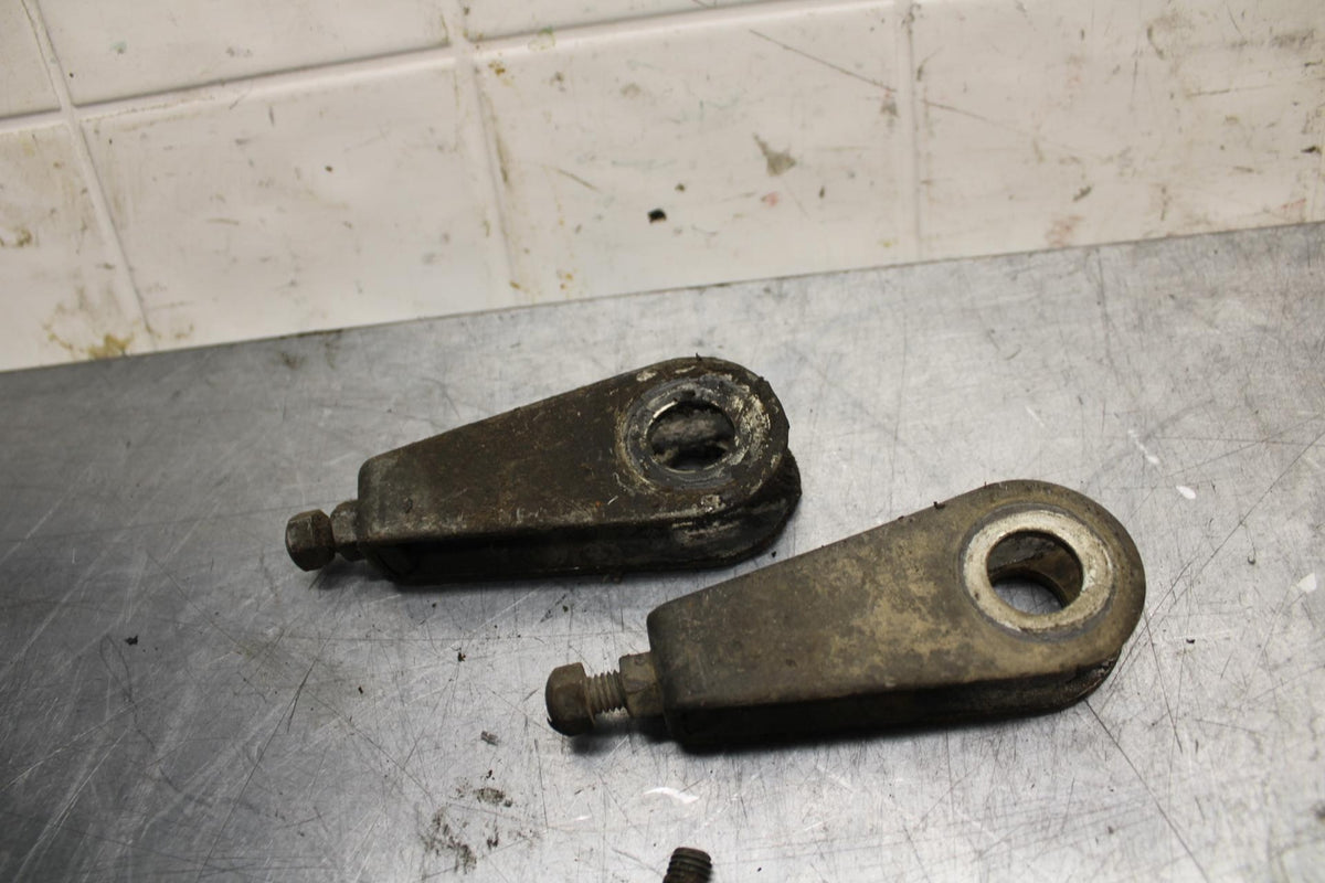 75 SUZUKI GT 550 SWINGARM CHAIN TENSIONER ADJUSTMENT BRACKETS  BB72