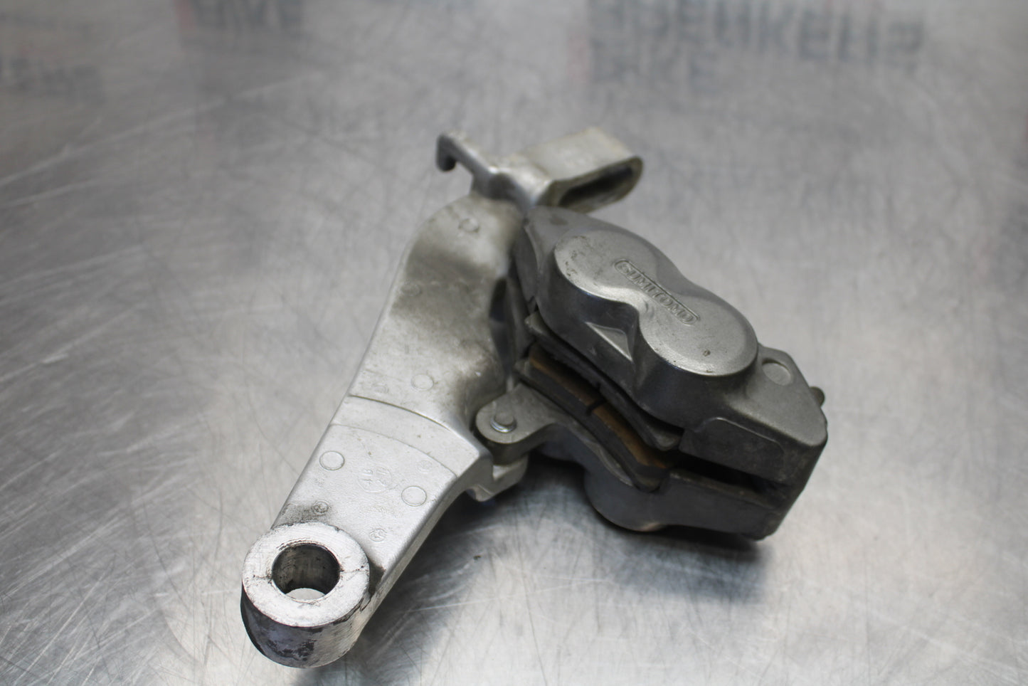 04 YAMAHA ROAD STAR XV1700A REAR BACK BRAKE CALIPER W MOUNT BRACKET BB155
