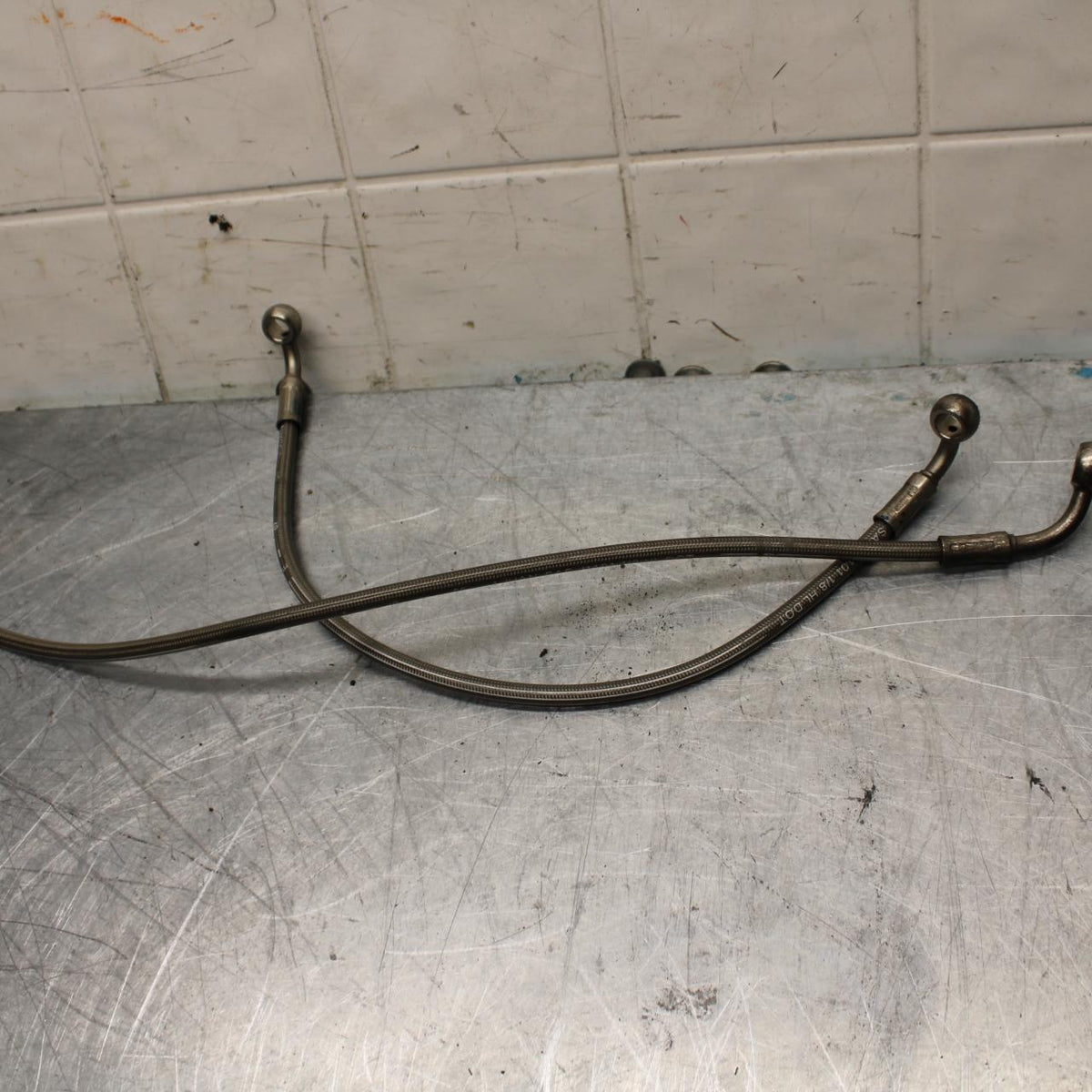 06-07 TRIUMPH DAYTONA 675 DAYTONA 675 BRAIDED FRONT BRAKE CALIPER HOSES  BB441