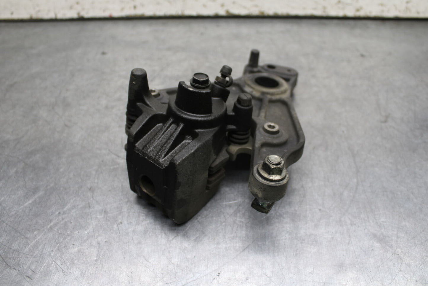 12-13 KAWASAKI Z1000 REAR BACK BRAKE CALIPER W MOUNT BRACKET BB743