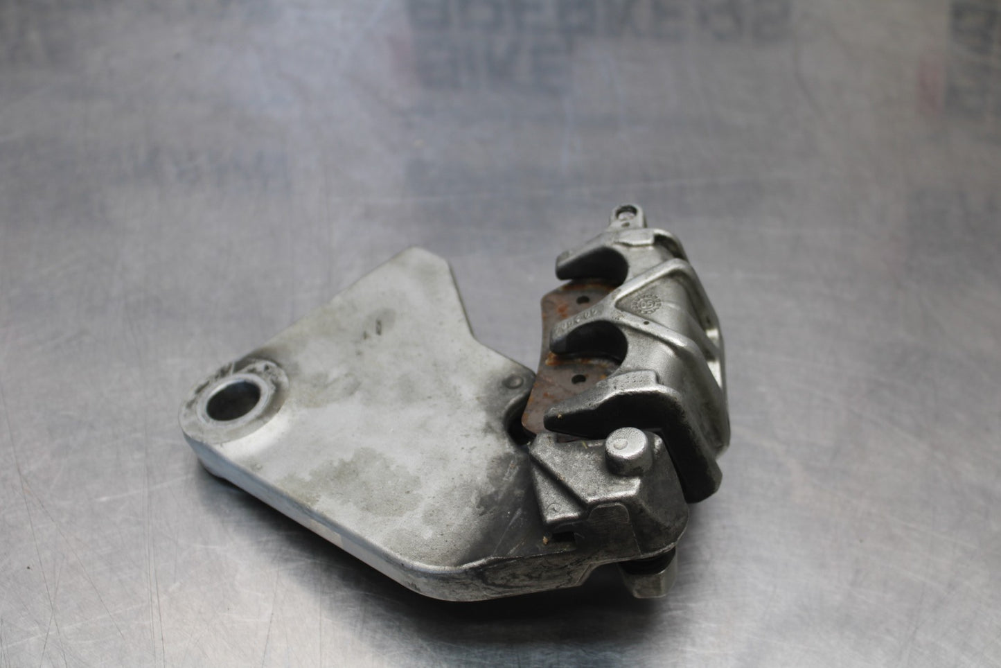 05-06 VICTORY KINGPIN DELUXE REAR BACK BRAKE CALIPER W MOUNT BRACKET BB195