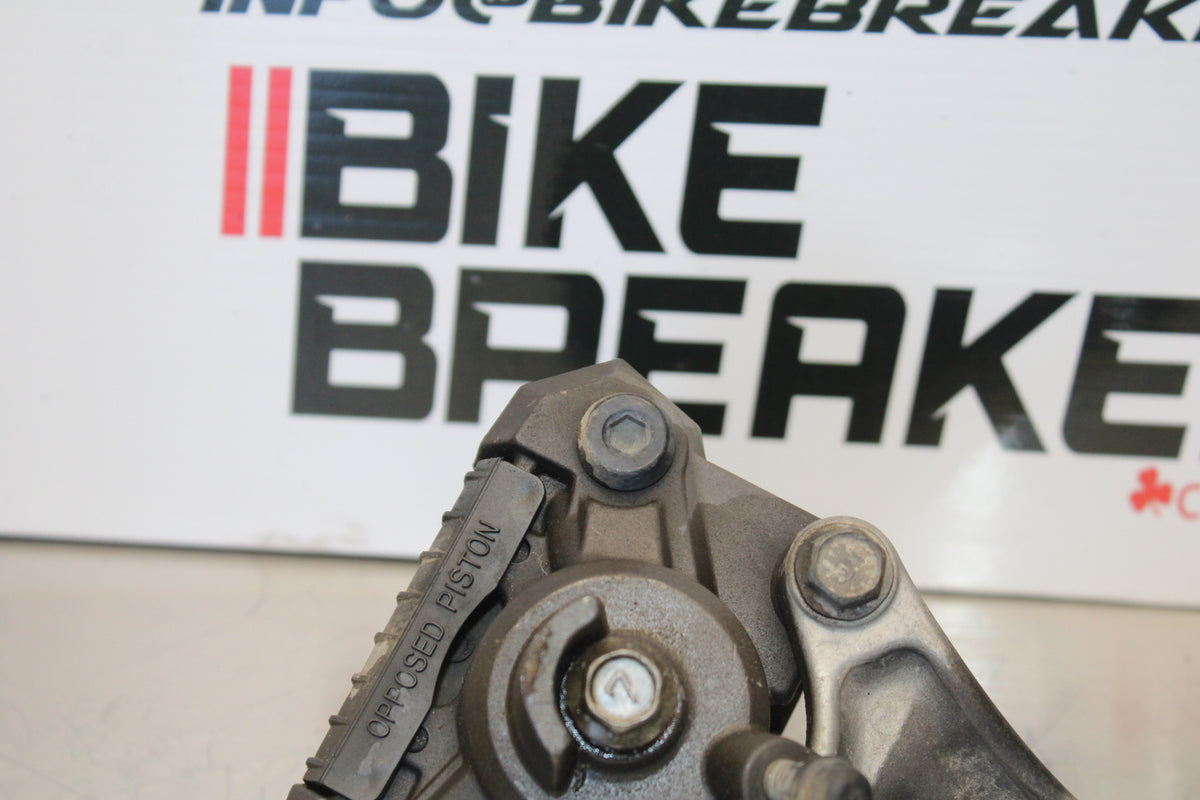 00 SUZUKI SV650 REAR BACK BRAKE CALIPER W MOUNT BRACKET BB156