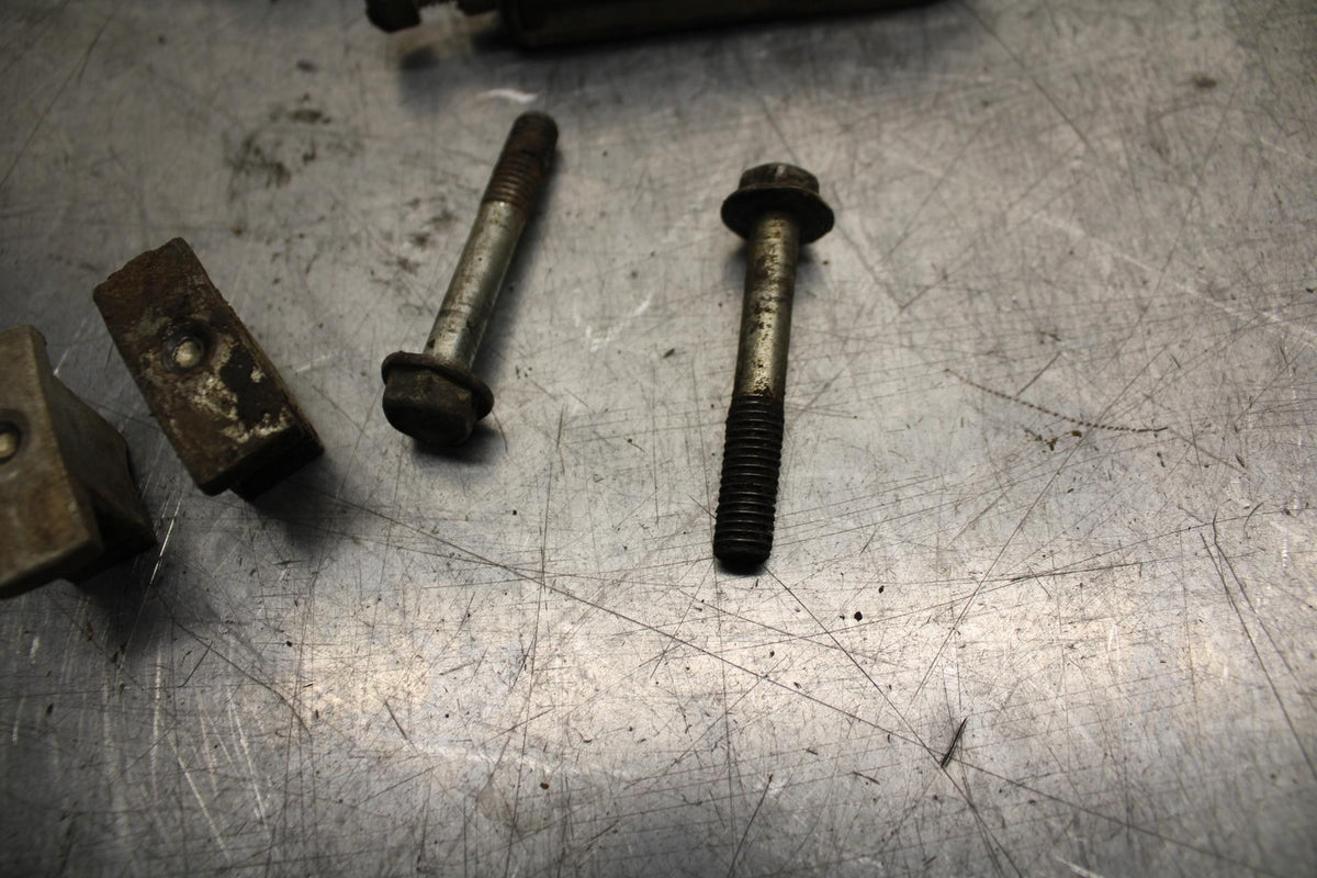 75 SUZUKI GT 550 SWINGARM CHAIN TENSIONER ADJUSTMENT BRACKETS  BB72