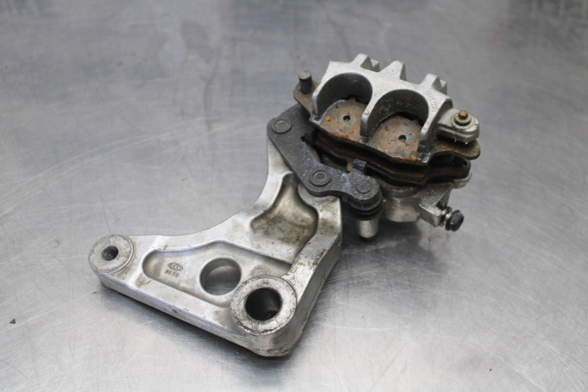 03 KAWASAKI VULCAN 1600 REAR BACK BRAKE CALIPER W MOUNT BRACKET BB865