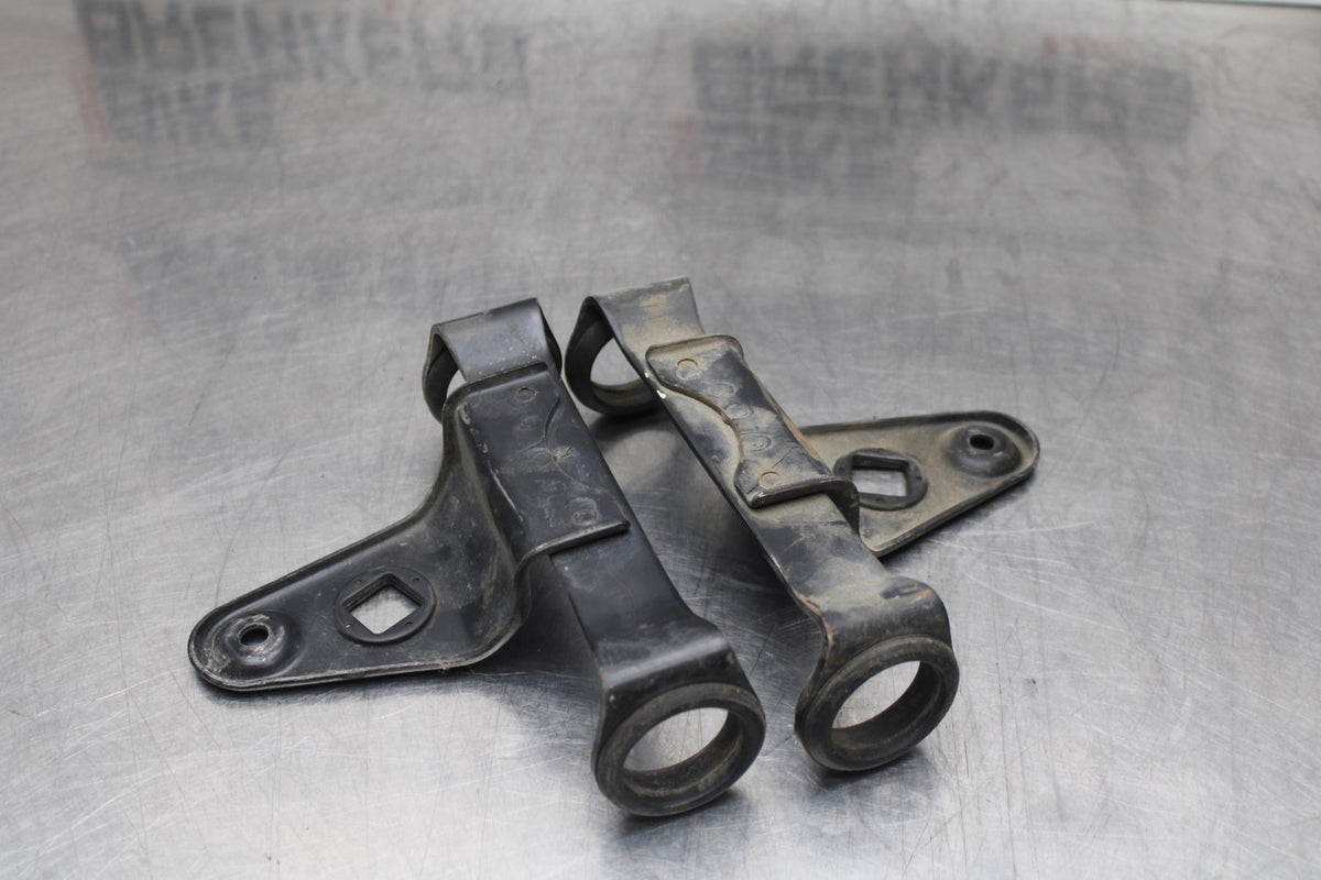 77 SUZUKI GS750 FRONT HEADLIGHT BRACKET PAIR FORK EAR BB779