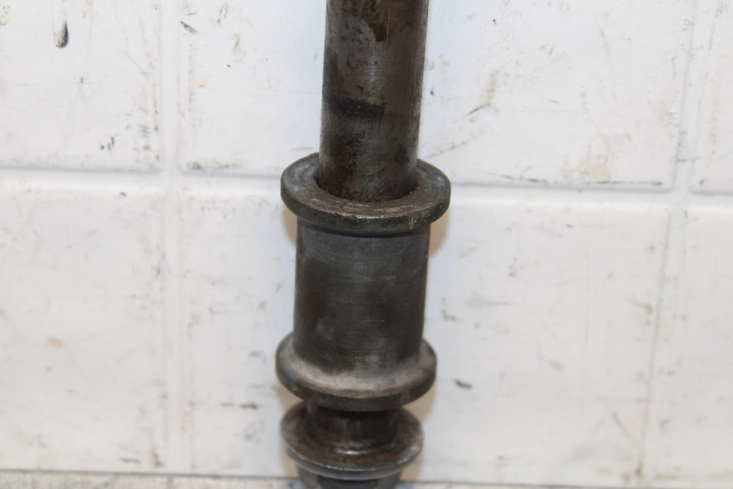 1977 Honda CB550K --- REAR AXLE BACK WHEEL PIVOT BOLT AXEL 42301-300-020 BB592