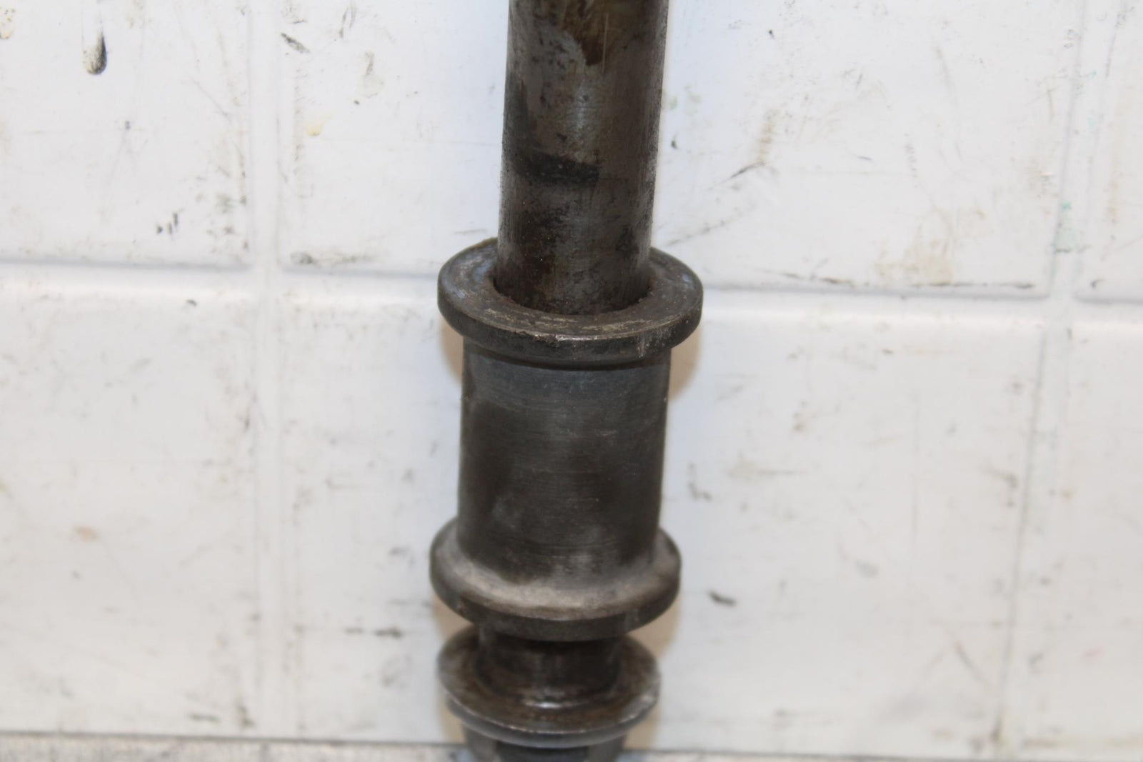 1977 Honda CB550K --- REAR AXLE BACK WHEEL PIVOT BOLT AXEL 42301-300-020 BB592