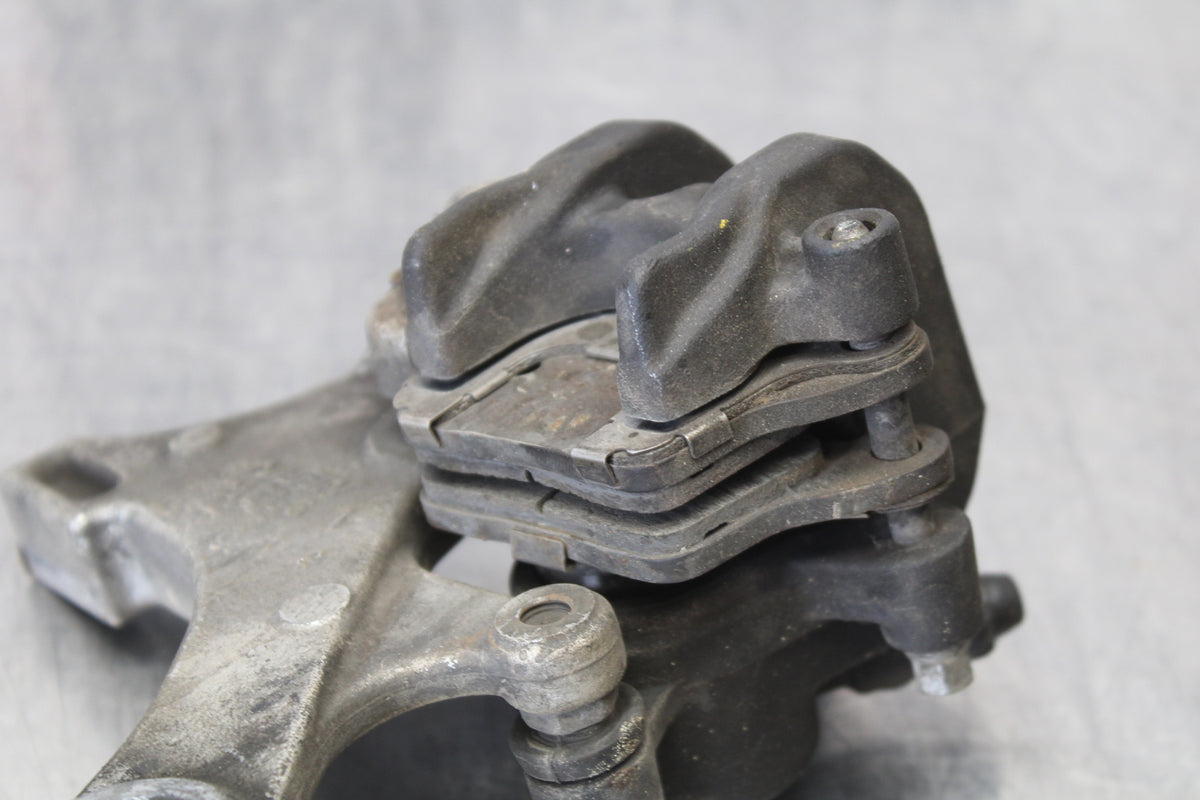 06-07 HONDA CBR1000RR REAR BACK BRAKE CALIPER W MOUNT BRACKET BB166
