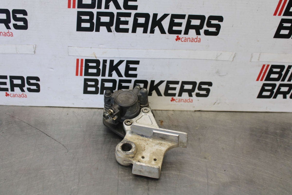 06 KAWASAKI KLR650 REAR BACK BRAKE CALIPER W MOUNT BRACKET BB919