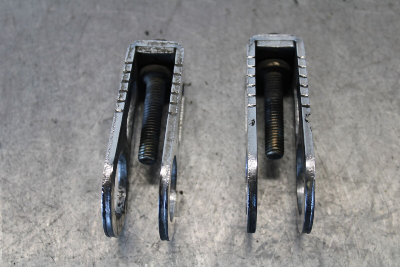 03-04 HONDA CBR600RR SWINGARM CHAIN TENSIONER ADJUSTMENT BRACKETS BB661