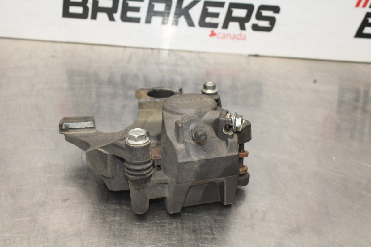 08-10 SUZUKI GSXR 600 REAR BACK BRAKE CALIPER W MOUNT BRACKET BB835