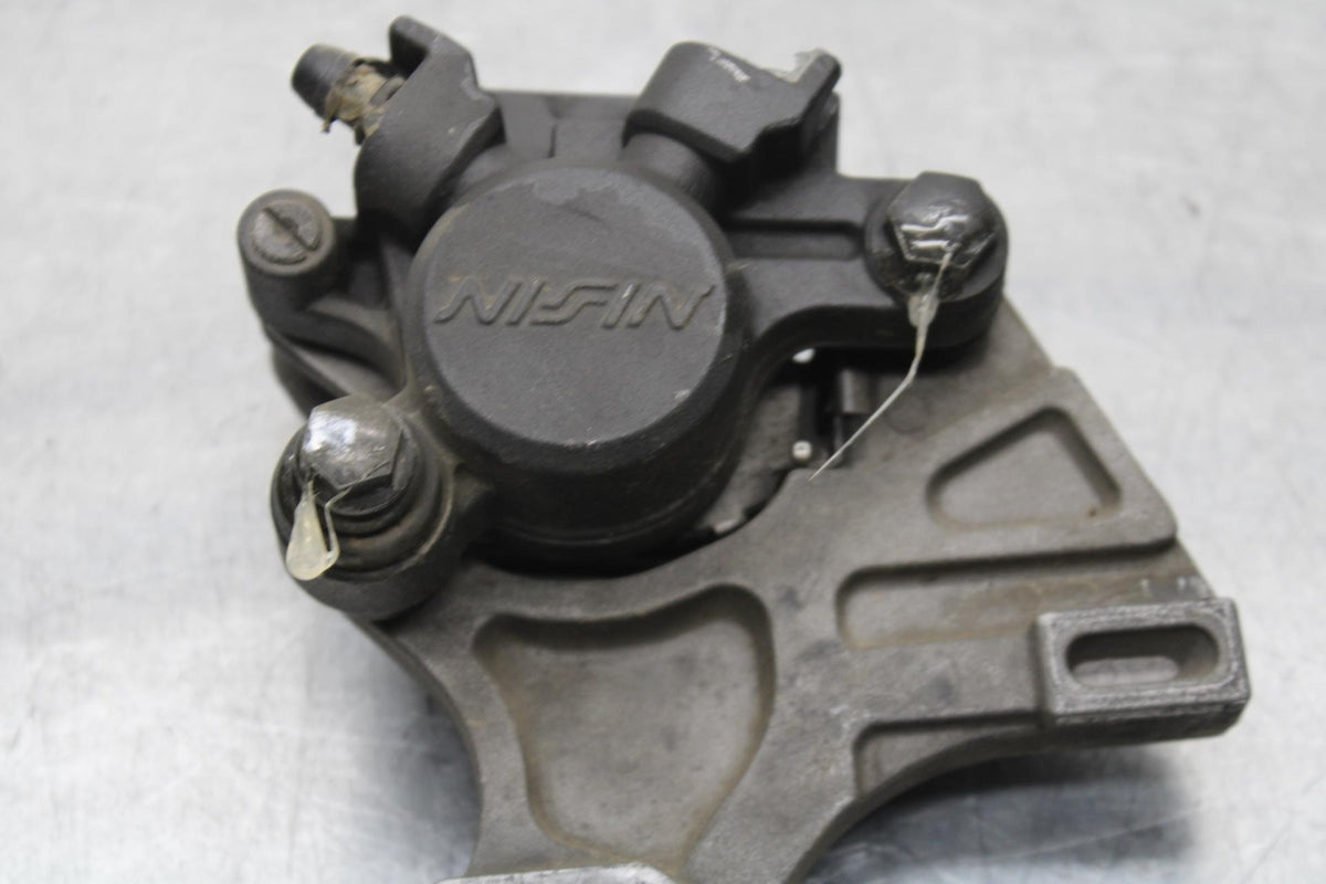 2007 Yamaha YZF R6S REAR BACK BRAKE CALIPER W MOUNT BRACKET BB594