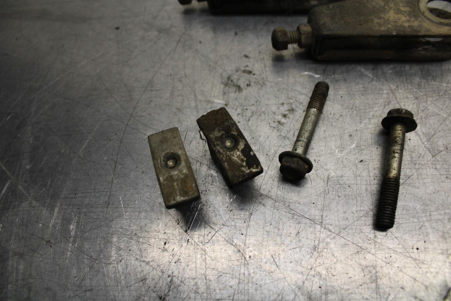 75 SUZUKI GT 550 SWINGARM CHAIN TENSIONER ADJUSTMENT BRACKETS  BB72