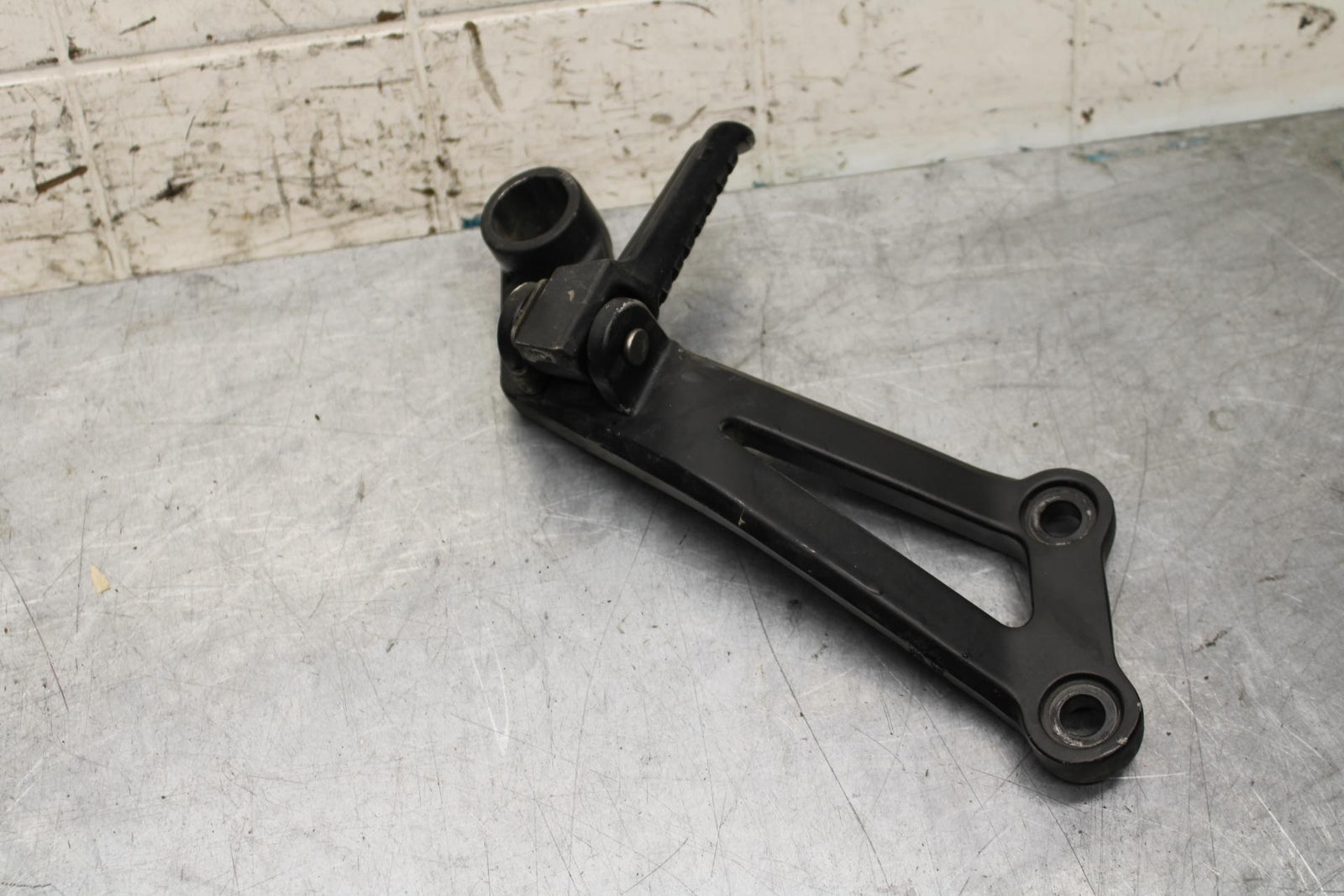 2000 Kawasaki Ninja ZX12R ZX1200A LEFT REAR BACK PASSENGER PEG 35063-1064