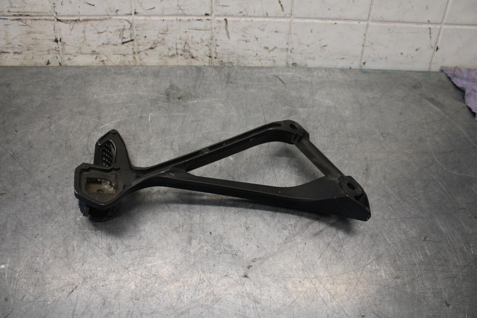 2011 Kawasaki Ninja ZX10R ZX1000K ABS LEFT REAR PASSENGER PEG 34028-0094  BB555