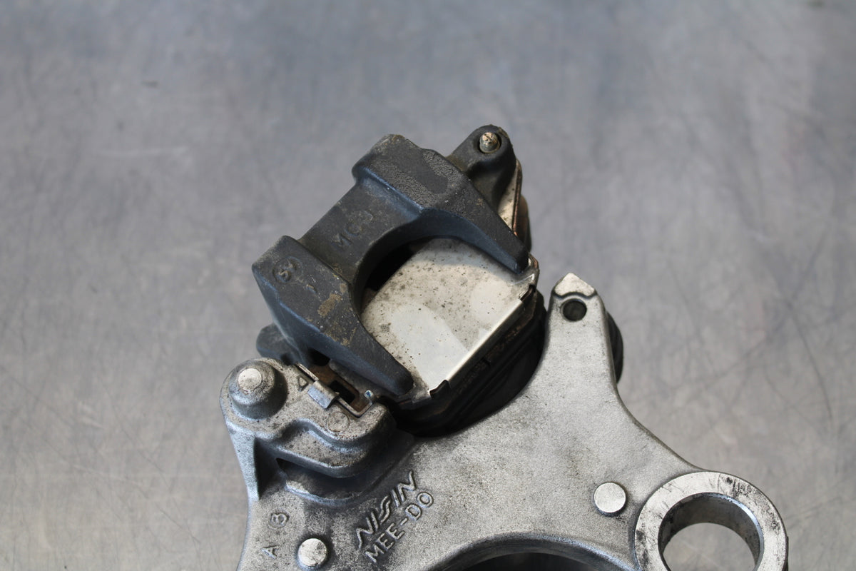 05-06 HONDA CBR600RR REAR BACK BRAKE CALIPER W MOUNT BRACKET BB159