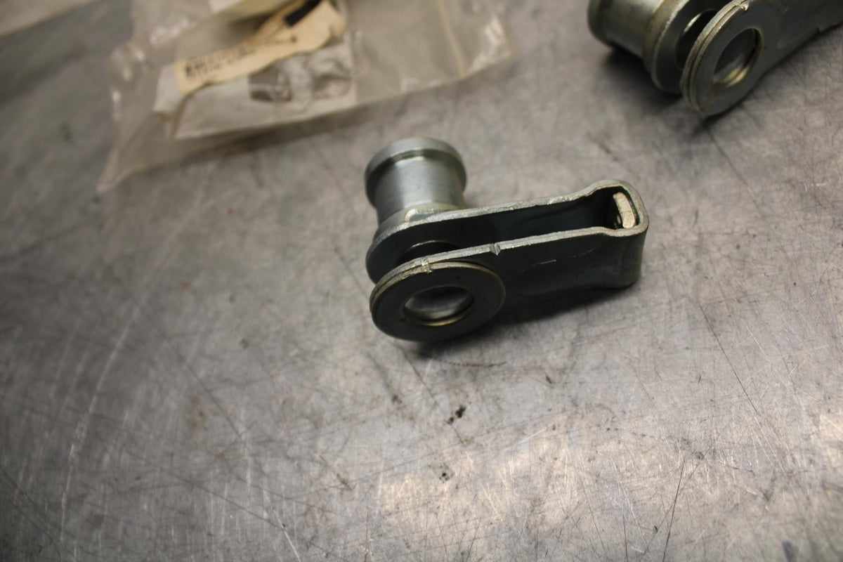 1978 Suzuki PE175  SWINGARM CHAIN TENSIONER BRACKETS 61410-41500 BB33