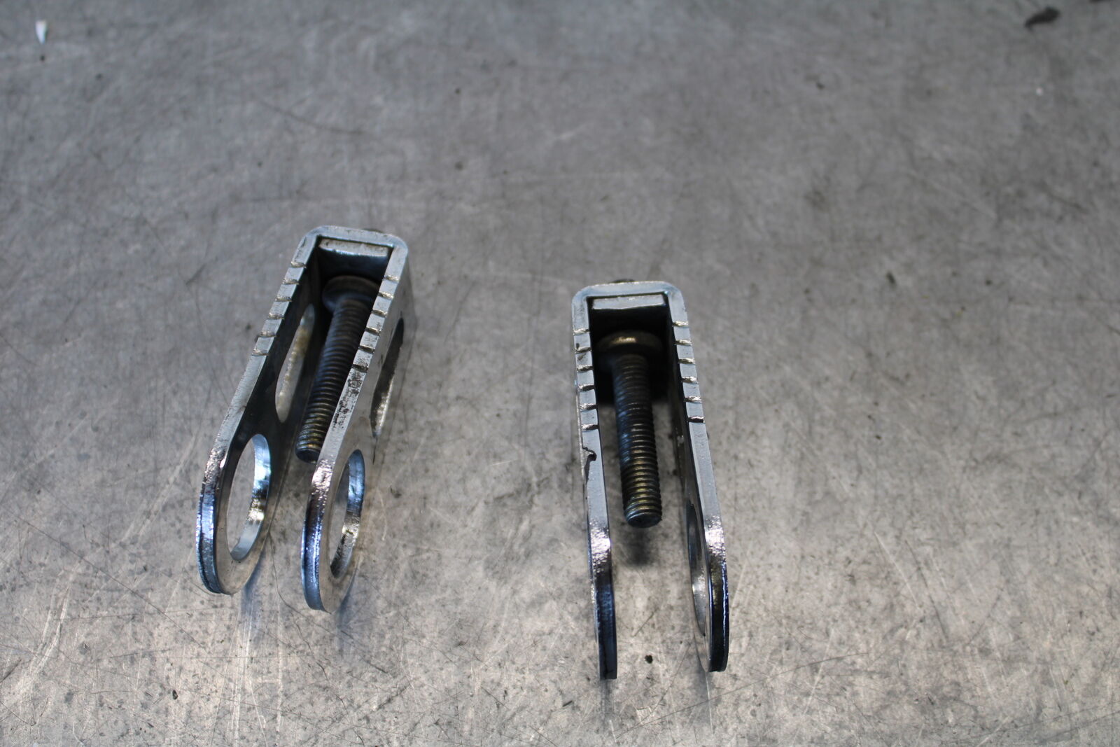 03-04 HONDA CBR600RR SWINGARM CHAIN TENSIONER ADJUSTMENT BRACKETS BB661