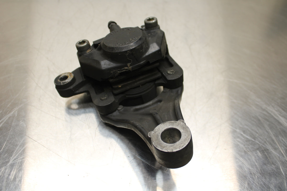 86 SUZUKI GS750ES REAR BACK BRAKE CALIPER W MOUNT BRACKET BB140