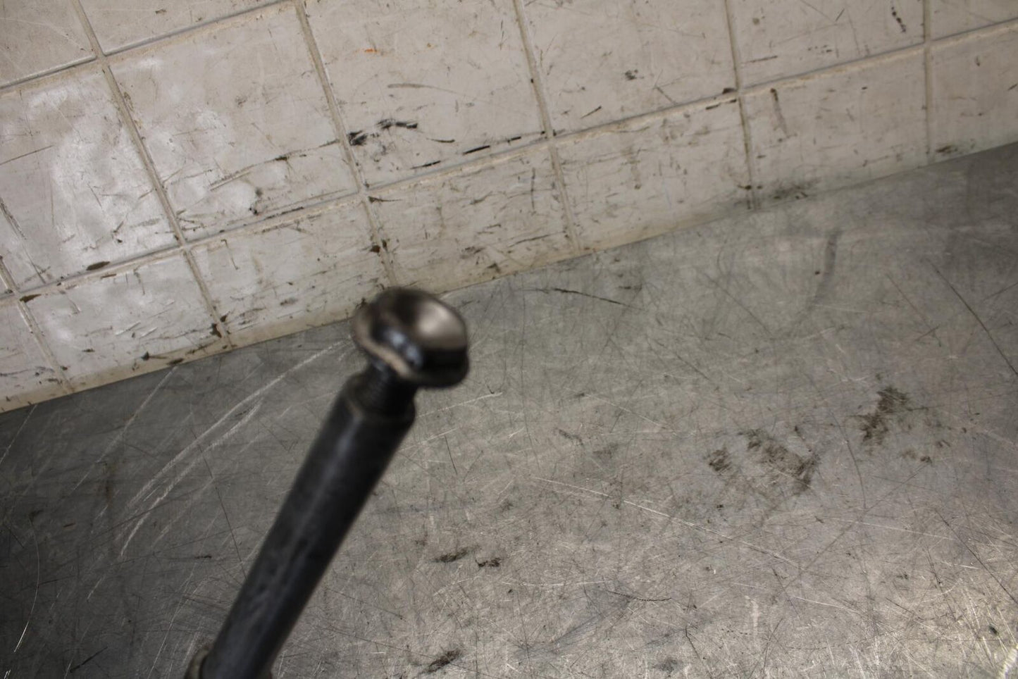 2011 Honda CBR600RR FRONT WHEEL RIM AXLE PIVOT BOLT 44301-MFJ-D00 BB520