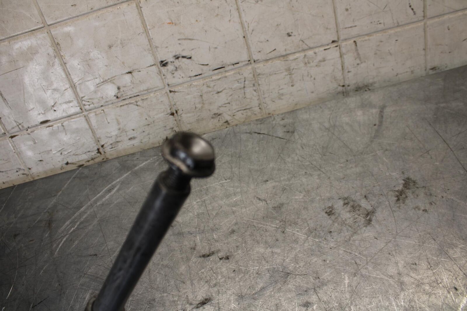 2011 Honda CBR600RR FRONT WHEEL RIM AXLE PIVOT BOLT 44301-MFJ-D00 BB520