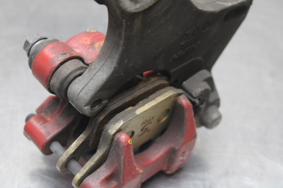 03-05 YAMAHA YZF R6  REAR BACK BRAKE CALIPER W MOUNT BRACKET BB793