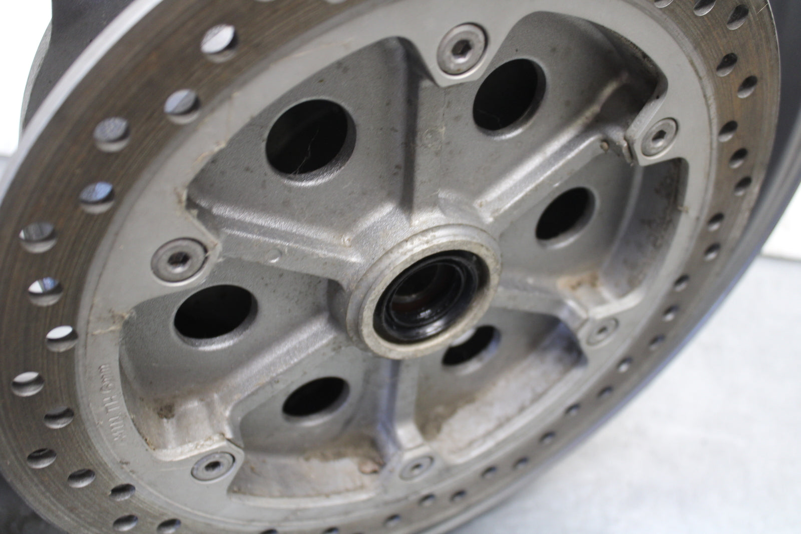 04-12 HONDA ST1300A REAR WHEEL AND ROTOR BACK BRAKE DISC (ITEM B) BB669