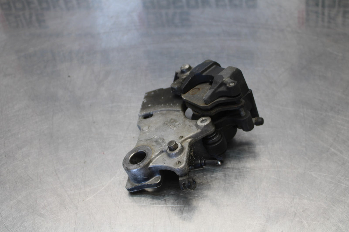 10 SUZUKI SV650 REAR BACK BRAKE CALIPER W MOUNT BRACKET BB181