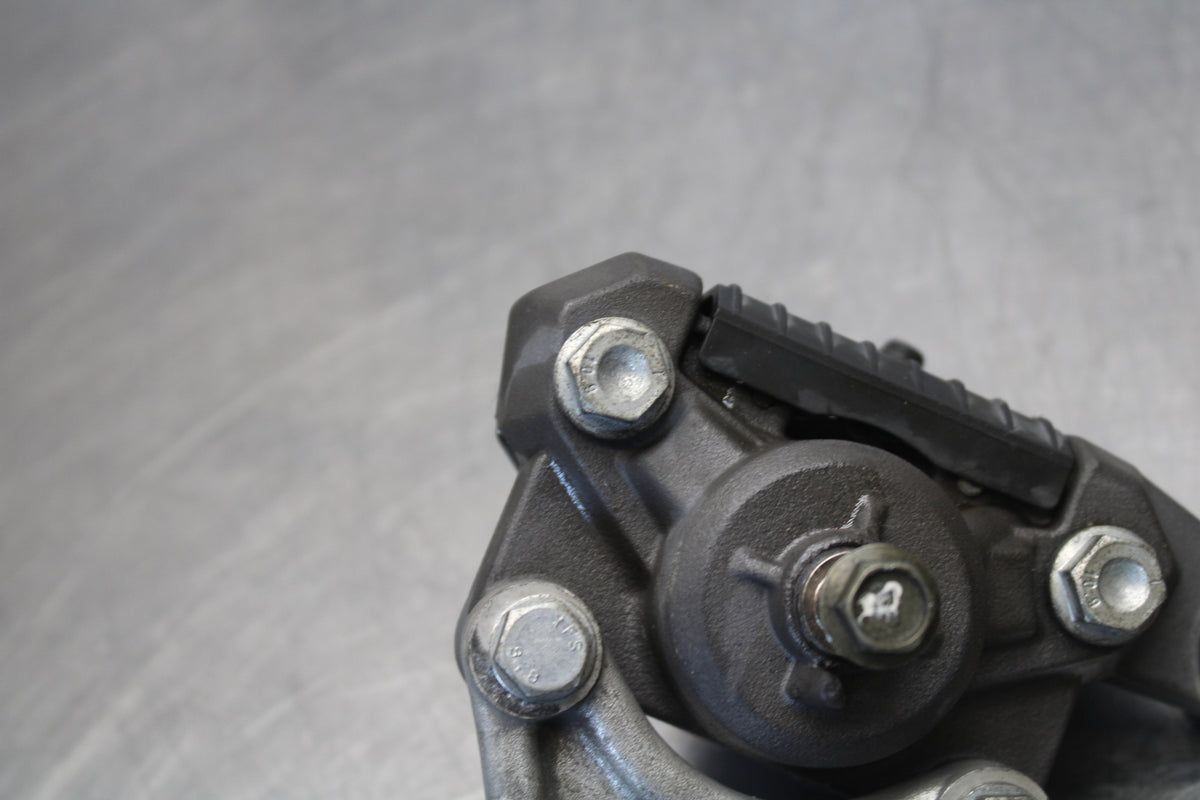 04-09 SUZUKI GS500F REAR BACK BRAKE CALIPER W MOUNT BRACKET BB165