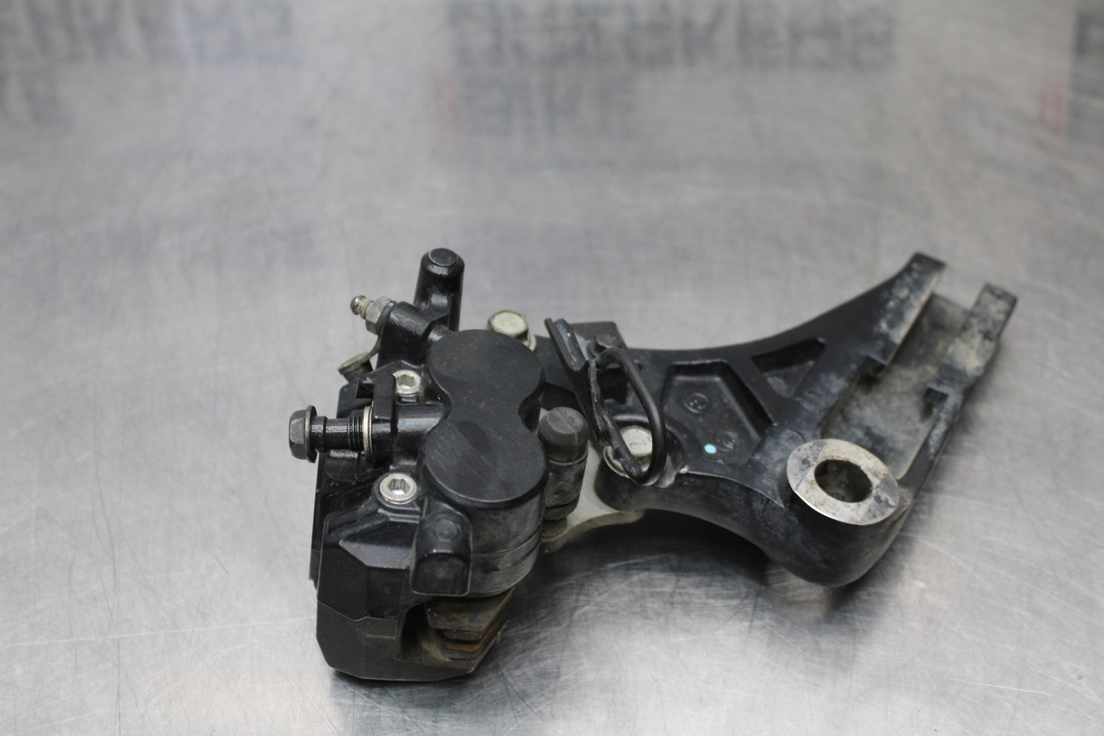 08-18 KAWASAKI KLR650 REAR BACK BRAKE CALIPER W MOUNT BRACKET BB183