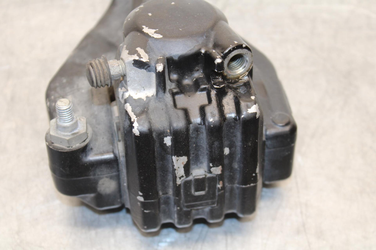 1977 Yamaha XS750 REAR BACK BRAKE CALIPER W MOUNT BRACKET BB554