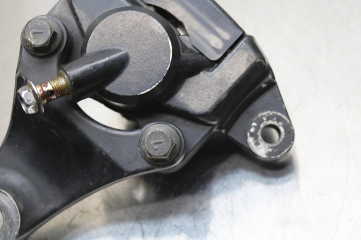 86 SUZUKI GS750ES REAR BACK BRAKE CALIPER W MOUNT BRACKET BB140