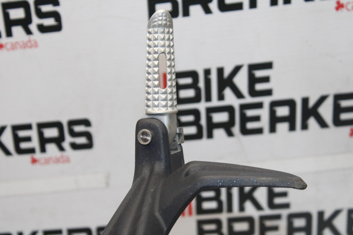 12 TRIUMPH STREET TRIPLE R RIGHT REAR BACK PASSENGER PEG BB914