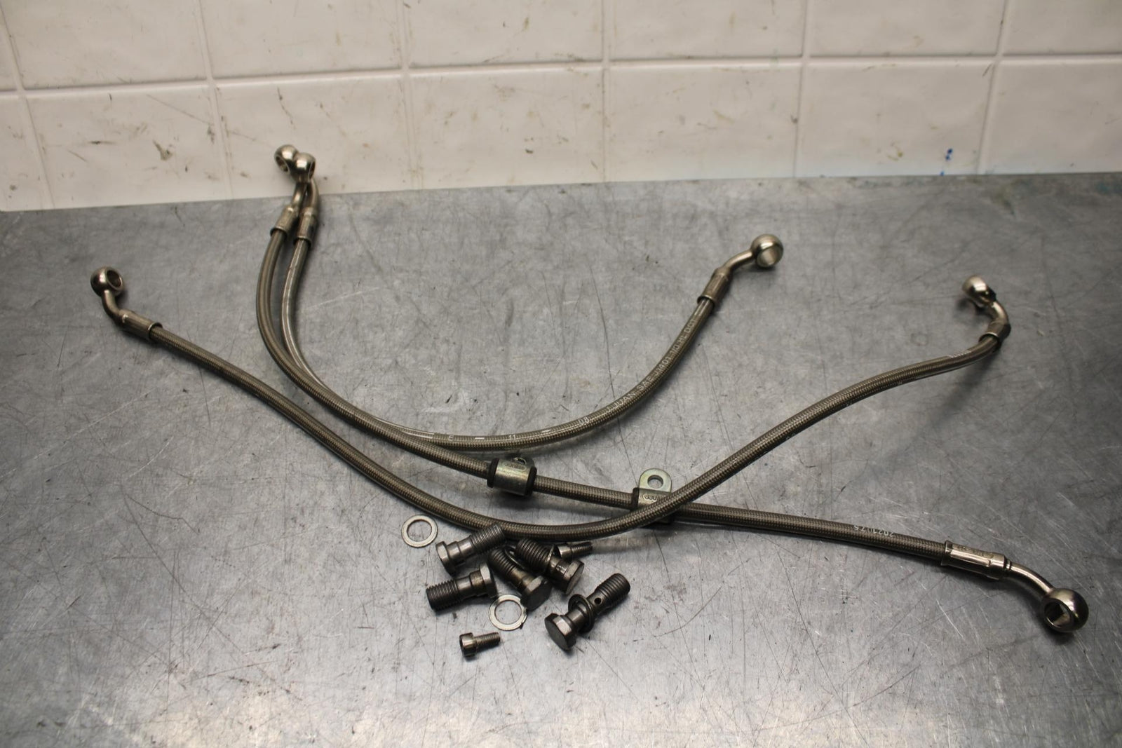2009 Triumph Daytona 675 FRONT BRAKE CALIPER HOSES LINES BB584