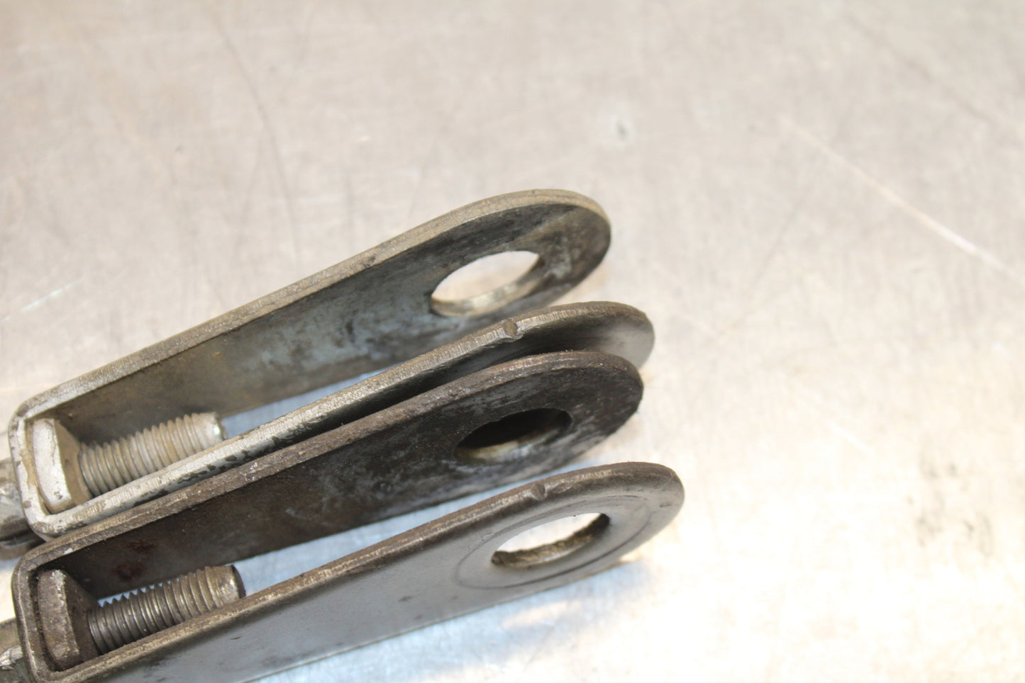 78 SUZUKI GS550E SWINGARM CHAIN TENSIONER ADJUSTMENT BRACKETS  BB133